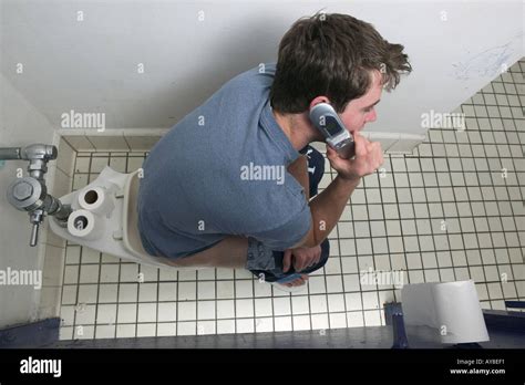 Sitting Toilet Phone Hi Res Stock Photography And Images Alamy