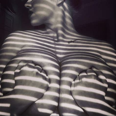 Her Fists Are Holding Those Massive Things In Place Porn Pic