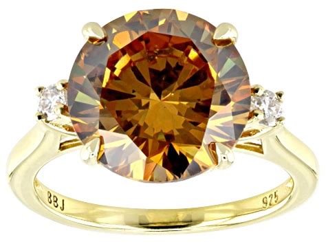 Orange Strontium Titanate And Moissanite K Yellow Gold Over Sterling