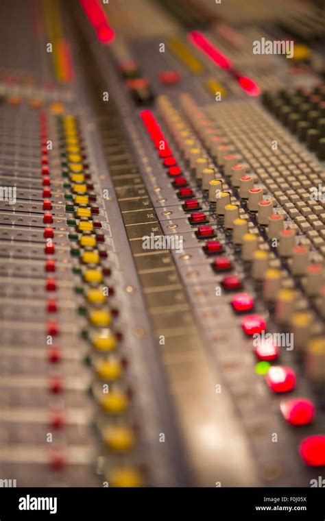 Audio Mixer Mixing Board Fader And Knobs At Night During A Live Concert