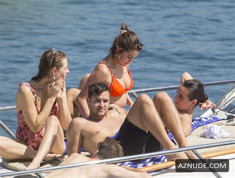 Selena Gomez Sexy In Black Orange Bikini On A Boat With Friends Around