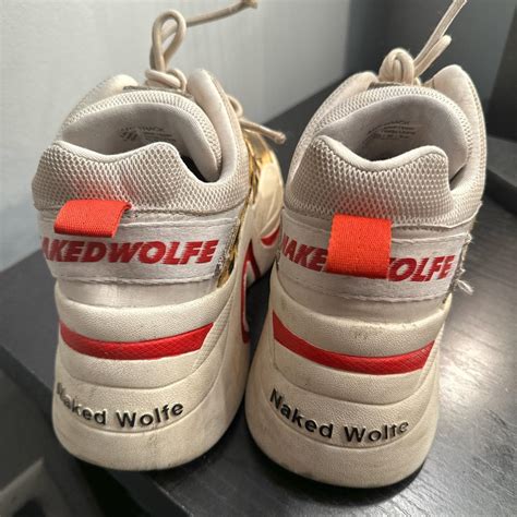 Naked Wolfe Women S White And Red Trainers Depop