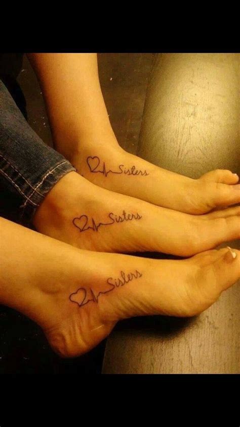 Two Girls With Matching Tattoos On Their Feet Both Have Hearts And The