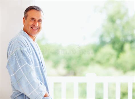 Smiling Mature Man Leaning Against Wall Copyspace Portrait Of A