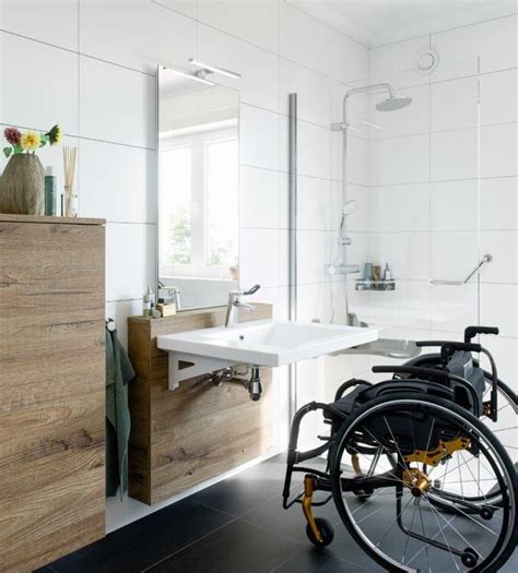 A Wheelchair Is Parked In Front Of A Sink