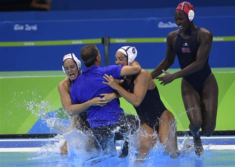 U.S. water polo team hangs all of their gold medals on their coach ...