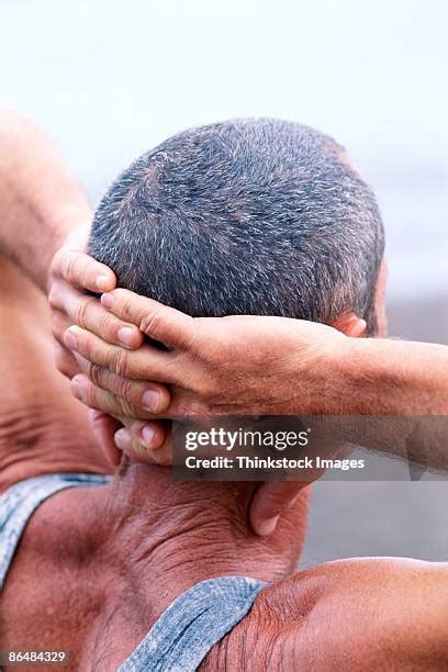 Stretching Hands Behind Head Rear View Photos And Premium High Res