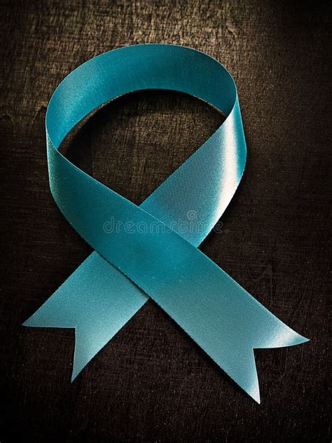 Light Blue Ribbon As Symbol Of Prostate Cancer Awareness Stock Photo