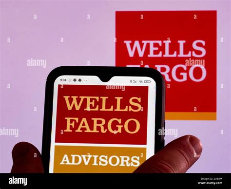 In this photo illustration, the Wells Fargo Advisors logo is displayed ...