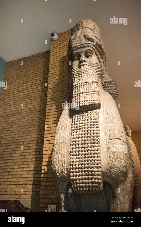 Colossal Assyrian Stone Sculpture Of A Human Headed Winged Bull From