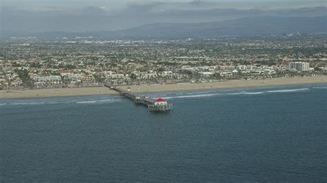 7 6K Stock Footage Aerial Video Of An Huntington Beach Pier And Beach