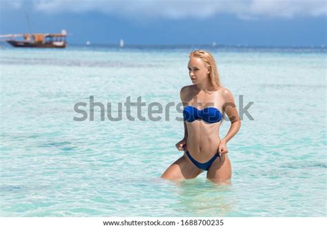 Beautiful Blonde Woman Blue Bikini Posing Stock Photo 1688700235 Shutterstock