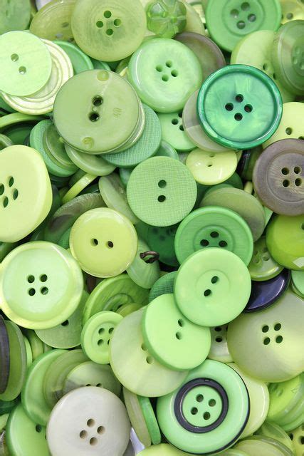 Many Green And White Buttons Are Grouped Together