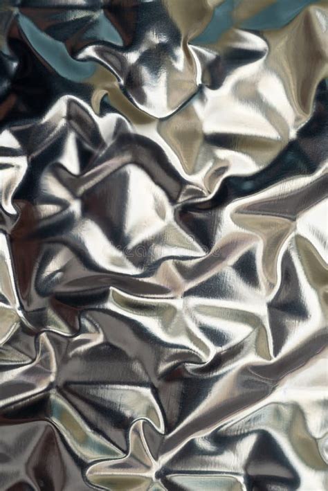 Blurry Abstract Smooth Crumpled Silver Aluminum Foil Background Texture