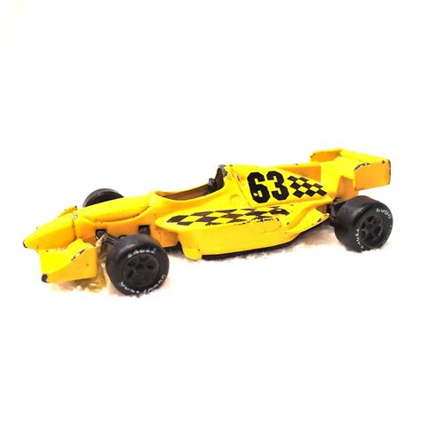 Maisto Formula One Race Car #63 Yellow & Black | Property Room