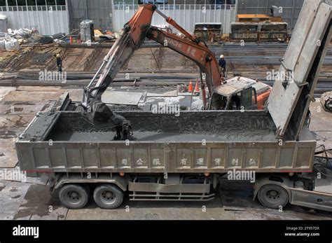 Digger Working In A Building Site During Construction Of A New Office