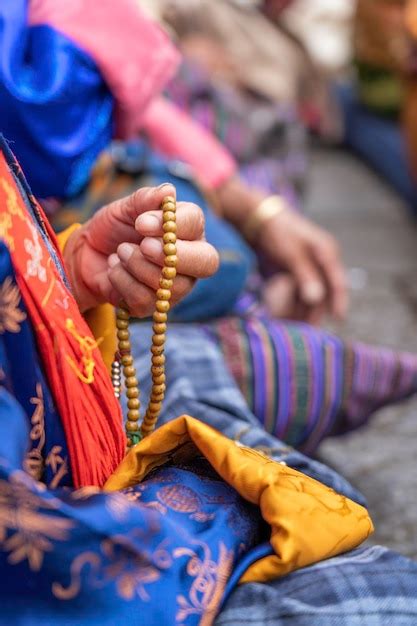 Premium Photo Close Up Of Hand Holding Prayer Beads