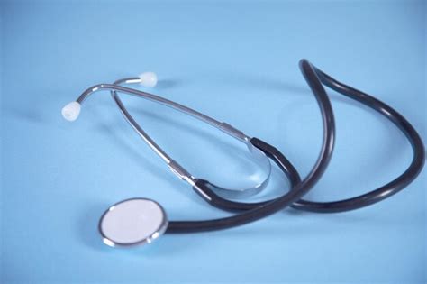 premium photo stethoscope  table