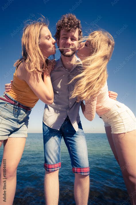 Two Girls Kissing One Boy Having Fun Outdoor Stock Photo Adobe Stock