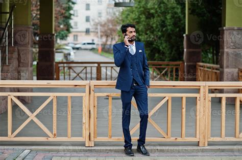 Stylish Beard Indian Business Man With Bindi On Forehead Wear On Blue