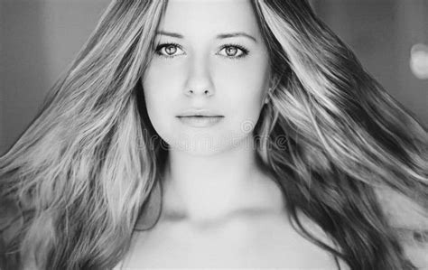 Beauty Hair Care And Natural Makeup Look Beautiful Woman With Long Blonde Wavy Curls Hairstyle