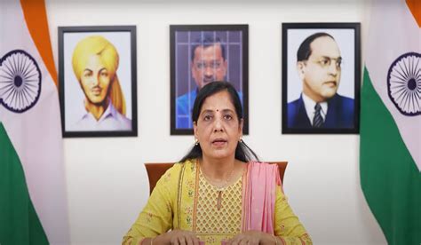 Portrait Of Arvind Kejriwal Behind Sunita Kejriwal Delhi CM Message For