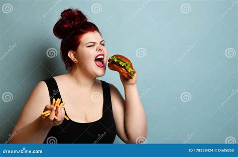 Happy Overweight Fat Woman Happy Hold Burger Cheeseburger Sandwich With