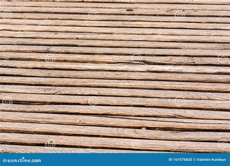 Thin Brown Wooden Slats Background Parallel Lines Blurred Background