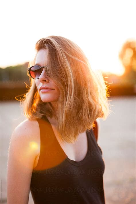 Woman With Casual Hair And Sunglasses On A Sunny Day By Stocksy Contributor Alexandra Bergam