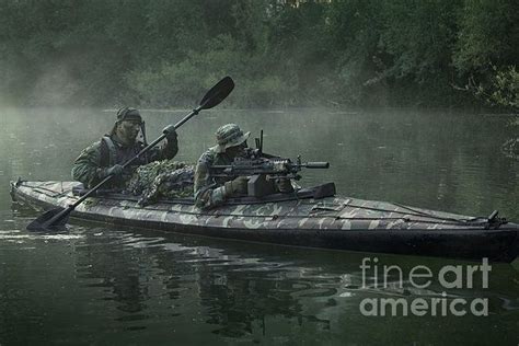 Kayak Soldiers Navy Seals Navigate The Waters In A Folding Kayak