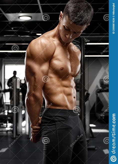 Muscular Man Showing Muscles In Gym Strong Male Naked Torso Abs Stock