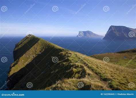 Kallur Lighthouse Hiking Trail, Kalsoy Island, Faroe Islands Stock ...