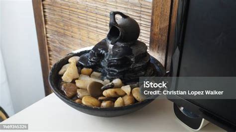 Zen Water Fountain In A Desk Stock Photo - Download Image Now - Desk ...