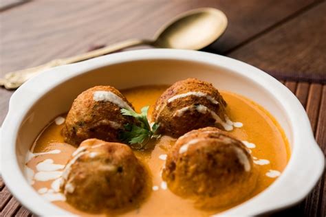 Premium Photo Malai Kofta Curry Is A Mughlai Special Recipe Served In