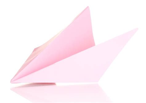 Premium Photo | Origami paper airplane isolated on white