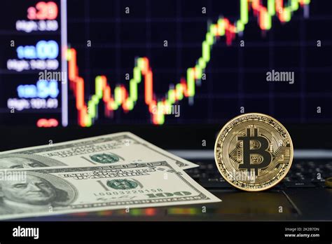 Bitcoin Coins On Keyboard With Trading Exchange Graph Stock Photo Alamy