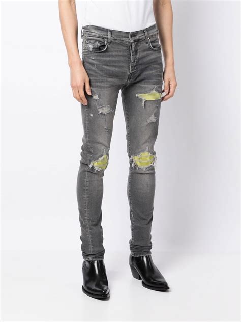 Amiri Mid Rise Ripped Skinny Jeans Farfetch