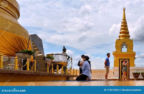 Bangkok Thailand Young Couple Praying In Front Of Big Golden Buddah