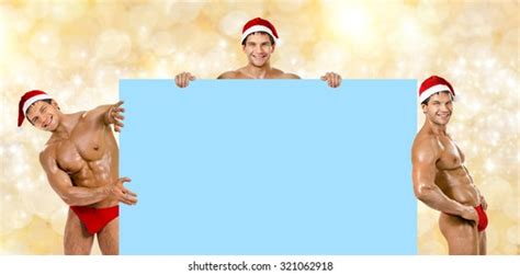 Three Muscular Bronzed Handsome Sexy Santa Stock Photo 309973235