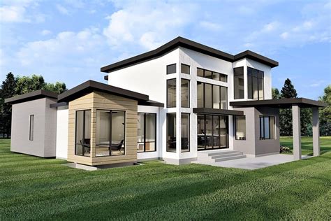 Modern Home Plan With Home Office And 2 Story Great Room 490027NAH