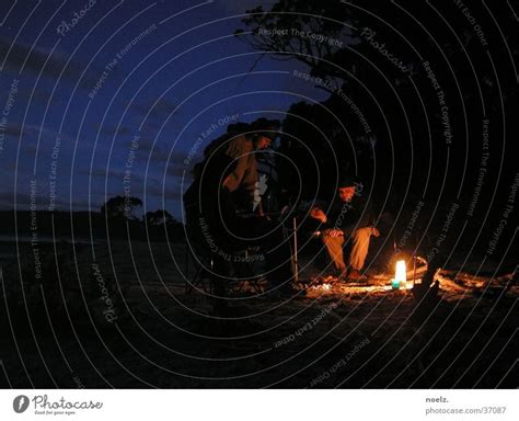 NIGHT BEACH CAMPFIRE Night - a Royalty Free Stock Photo from Photocase