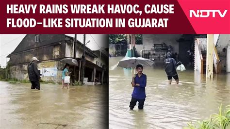 Gujarat Rain News Today Heavy Rains Wreak Havoc Cause Flood Like