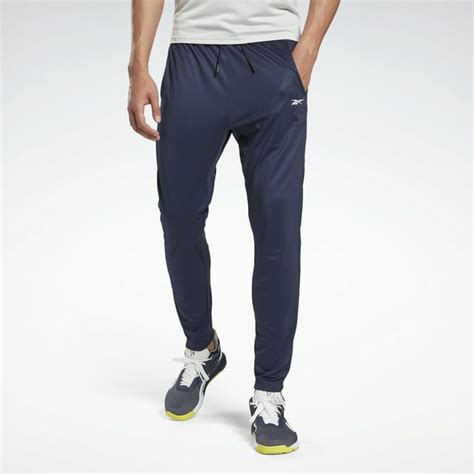 Reebok Mens Slim Fit Workout Ready Track Pant 100 Polyester Tricot Ankle Zips Designed For