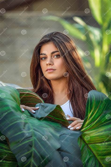 Beautiful Woman With Perfect Body Standing Up On The Beach Wearing