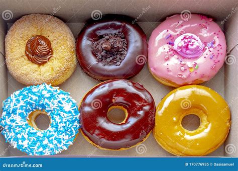 Top View Inside Of A Tim Hortons Sex Donuts Box Med Dulce De Leche