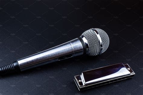 Microphone and harmonica featuring microphone, mic, and mouth organ ...