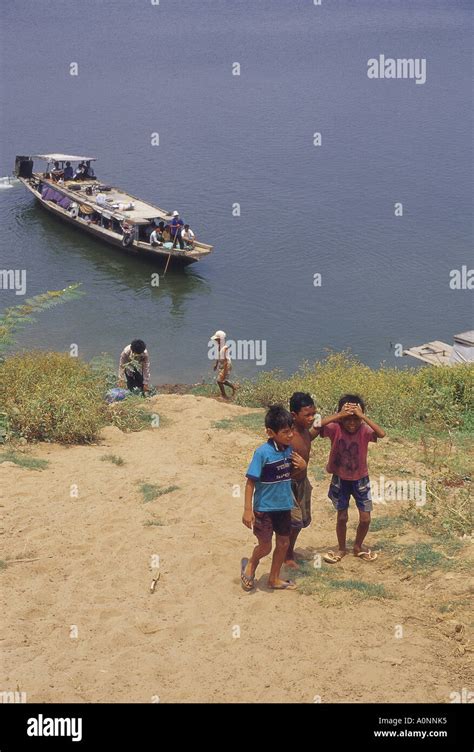 River boat and river bank Mekong Cambodia South East Asia Stock Photo ...