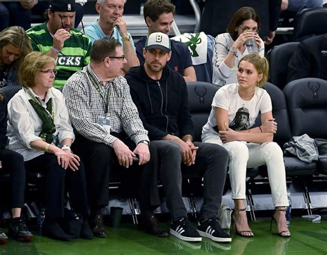 Aaron Rodgers Finds Love Courtside Nfl Star In A Romantic Relationship