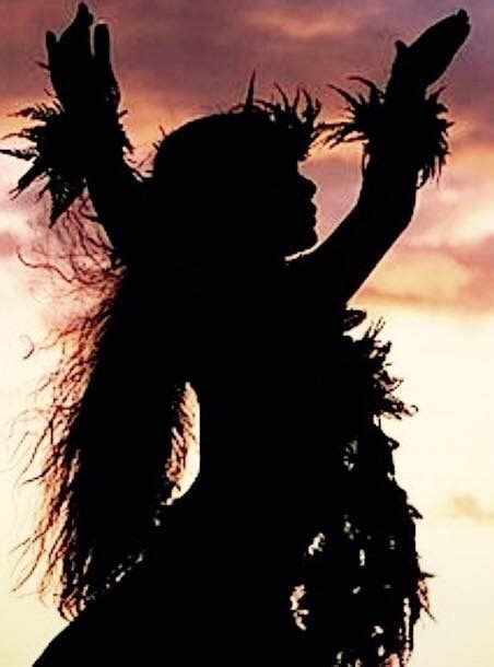 The Silhouette Of A Woman With Long Hair Is Shown In Front Of An Orange