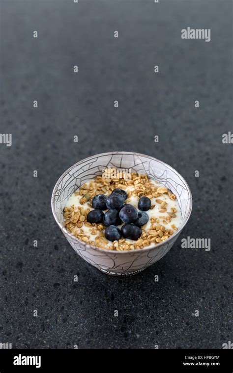 Greek yogurt with blueberries and oats Stock Photo - Alamy